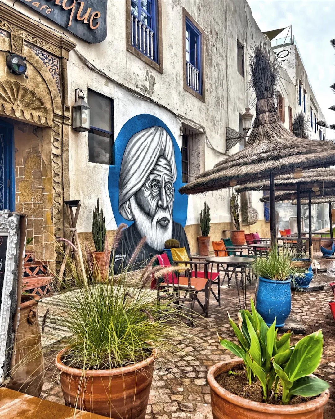 Café terrace and mural in the Essaouira medina